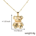 Detalle de un collar con colgante de oso dorado con perlas y dimensiones del producto - Dorado (Solo Colgante)