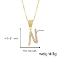 Sparkling gold letter N pendant necklace with inlaid zircons and dimensions marked - Letter N-Gold