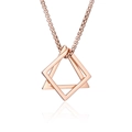 Detailansicht der ineinandergreifenden roségoldenen Anhänger an einer Box-Kette - Roségold