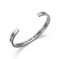 Detail of silver brushed stainless steel cuff with engraved sisterhood quote and arrows - Not Sisters(B948) / Silver