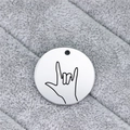 Close-up of a stainless steel round pendant with an engraved I Love You sign language hand - I Love You Gesture (AL333)