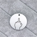 Macro shot of silver stainless steel round tag featuring a minimalist hand gesture engraving - Disdain Gesture (AL336)