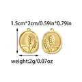 Vue macro de pendentifs fleurs dorés avec dimensions 1,5x2cm et détails de relief vintage - Style Botanique Ovale Doré (TP2203-02)