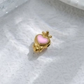 Macro shot of gold pendant with pink heart enamel, crown motif, and small bow detail - Pink Heart Crown Style With Hook (TZ-TP1001-02-pink)