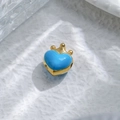 Macro detail of sky blue enamel heart charm with golden crown on white background - Blue Heart Crown Style (TZ-TP1008-02-blue)