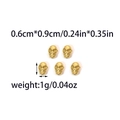 Macro-opname van 18k vergulde schedelkralen met gedetailleerde afmetingen en gewicht - Punk Schedel Stijl (TZ-TP0867-02)