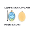 Colgante de flor azul en acero inoxidable dorado ovalado para creación de joyería DIY - Flor Ovalada de Arena Movediza Azul (TZ-TP1087-02-blue)