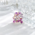 Close-up of purple enamel flower pendant with golden metal edges and hanging loop - Purple Flower Cluster (TZ-TP1048-02-purple)