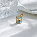 Gold stainless steel hourglass pendant with light blue enamel on white marble surface - Blue Hourglass Style (TZ-TP0988-02-blue)