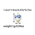 Blue floral ceramic heart pendant charm with gold metal loop and size measurements - Ceramic / Blue and White Porcelain Heart
