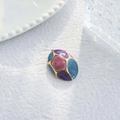 Macro shot of French vintage enamel flower pendant with purple and blue swirl texture - Oval Retro Sand Texture Pendant (TZ-TP1083-02-shense)