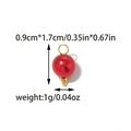 Detailed view of a red pearl charm with golden beads and technical size measurements - Red Round Bead (TZ-TP1959-02)