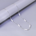 Detailed view of silver stainless steel necklace with elegant white pearl clusters - Silver