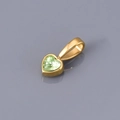Detail of light green heart-shaped zircon pendant with gold-plated metal clasp - March