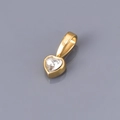 Macro shot of heart-shaped zircon pendant with gold-plated bezel and wide bail design - April