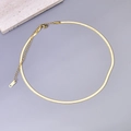 Detailed close-up of golden flat snake chain with K18 engraving and lobster clasp - 38+11cm Snake Chain (L89) / Gold
