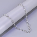 Detail shot of silver cuban chain featuring unique hammered rhomboid metal links - Hammered Rhombus Chain / Silver
