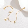 Golden stainless steel bracelet featuring sun charm and sparkling cubic zirconia stones - Radiant Sun Style (OLBB1311-taiyang)