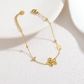 Bracelet en acier inoxydable doré avec des breloques d'océan comme poulpe, étoile et queue - Style Pieuvre Étoile Queue de Poisson (OLBB1313-F)