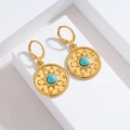 Boucles d'oreilles pendantes en acier plaqué or 18k avec turquoise et motif étoile - Rayonnement Stellaire Rond (OLBE1255-A)