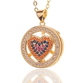 Detailopname van gouden hartketting met gekleurde zirkoon en roterende buitenste ring - Hart Stijl (C)
