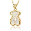 Close-up of gold plated bear pendant featuring white enamel and heart-shaped zircon - White Enamel Bear (D440-4)