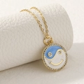 Gold necklace with micro-paved yin yang smiley face pendant in blue and white enamel - Gold
