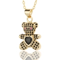 Macro view of crystal paved teddy bear pendant with black heart stone and gold chain - Full Zircon Black Bear (D442-3)