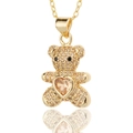 Close-up of gold bear pendant featuring a heart-shaped champagne zircon and micro-pave crystals - Full Zircon Champagne Bear (D442-2)