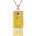 Detail of gold tarot pendant with yellow enamel, rose motif, and purple zircon - Yellow
