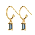 Detailed view of gold hook earrings featuring rectangular blue sapphire-style gemstones - Blue