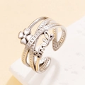 Chic multilayer stainless steel smile ring with clover design on a stone surface - Steel Color (J03838)