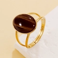 Vintage gold adjustable ring with oval brown cat-eye resin stone and hollow band - Brown