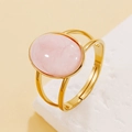 Vintage style gold adjustable ring featuring a large oval pink resin gemstone inlay - Light Pink