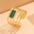 Adjustable gold geometric line ring with a large rectangular emerald green crystal - Gold Plated-Green Stone