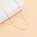 Minimalist 18K gold plated stainless steel snake chain necklace on white pedestal - Flat S-Link Style (Gold)