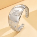 Silver adjustable vintage ring with starburst patterns and sparkling crystal accents - Steel without Diamonds