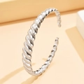 Polished stainless steel twisted cuff bracelet with elegant silver finish for women - Silver