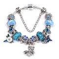 Silver snake chain bracelet with blue glass beads and butterfly unicorn charms - Blue Star Hummingbird Theme (Style 008)