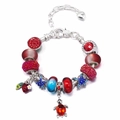 Detail of beaded bracelet with strawberry, starfish, and turtle charms in red and blue - 16cm / Red Strawberry and Sea Turtle Style (Style 004)