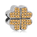 Silver four-leaf clover charm with bright orange crystals for DIY jewelry making - Orange Pave Clover Bead (016)