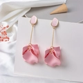 Detail view of elegant pink fabric flower drop earrings with golden connector and oval studs - Pink