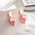 Detailed close-up of pink petal drop earrings with gold hooks on white satin - Pink (Style C)