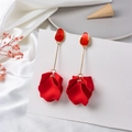 Detailed shot of long red petal earrings with gold metal stems on a white display card - Red (Style B)