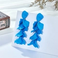 Detail of vibrant royal blue layered petal drop earrings on a white display card - Blue (A894)