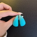Matte tiffany blue geometric C-shaped earrings held in hand to show size and scale - Cyan Blue (A325)