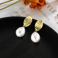 Baroque irregular pearl earrings with vintage gold embossed metal on black tray - Oval Embossed Pattern Gold Plate Pearl Earrings (A532)