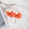 Detail of orange matte petal drop earrings with brushed gold disc and long metal bar - Orange Red