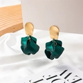 Detailed view of dark green petal drop earrings on white elegant card display - Pearly Green (Style C)