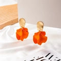 Close-up of bright orange petal earrings with elegant gold metal studs on white silk - Orange Petal Style (A662)